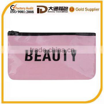 Fully lined high sheen cosmetic bag features a contrast color trim