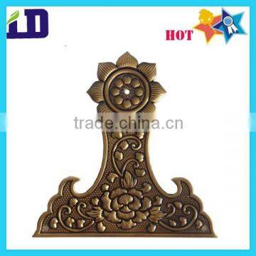 Antique metal embossed plaque