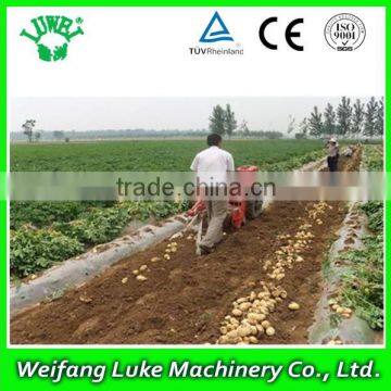 one row mini harvester for cassava walking tractor drived