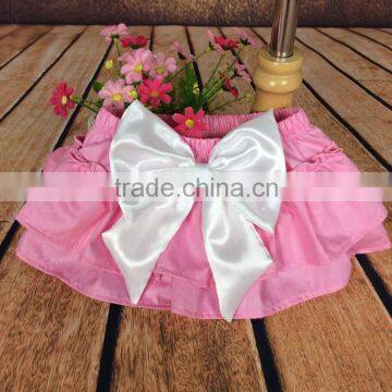 The newest design for baby girl ruffle raglan elastic pink color tutu divided skirt with big bowknot plain color adorable pants