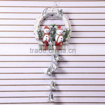 White snowman hanging christmas decorations
