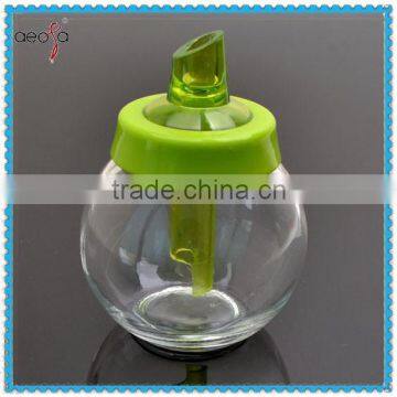 ball shaped clear glass body with color lid oil vinegar bottle