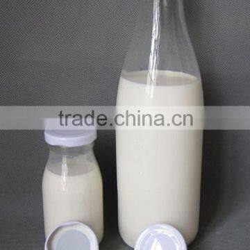 round milk glass bottle with screw top