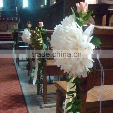 White tissue paper pom poms for chair decoration