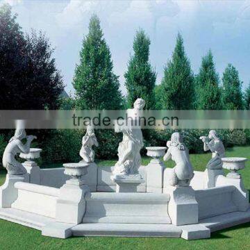 modern stone water fountain with marblestatues