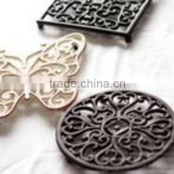 we sell Cast iron table mat/flower pot holder/table mat/cast iron cookware