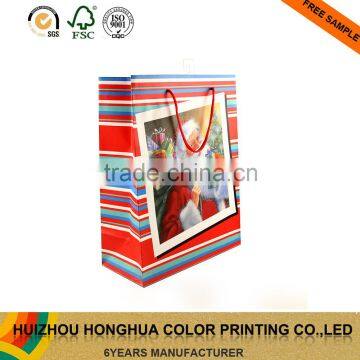 Wholesale shopping paper bags packaging paper gift bags with handles