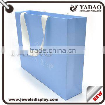 Free sample light blue paper shopping bags with white length handles on hot sale