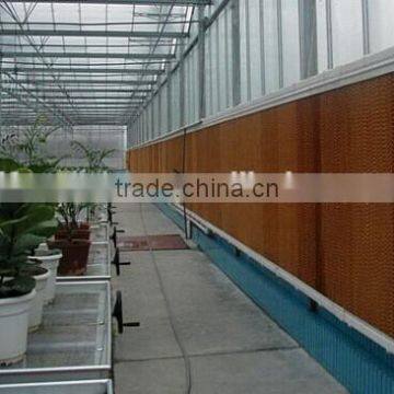 Greenhouse evaporative livestock cooling pad for poultry farm