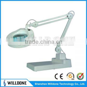 Industrial magnifying glass and lamp desktop