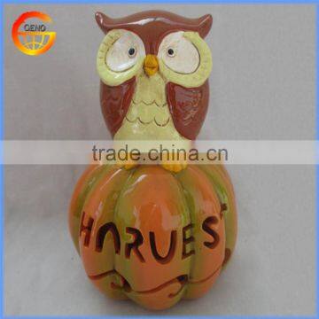 Nice halloween decoration ceramic owl on pumpkin