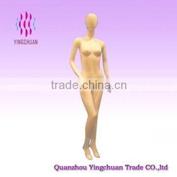 Faceless standing female window display manikin