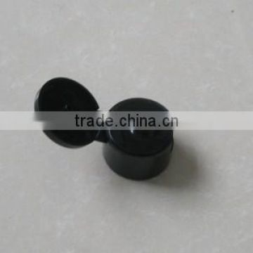 Flip top plastic cap