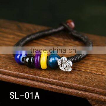 Braided porcelain charm bracelet