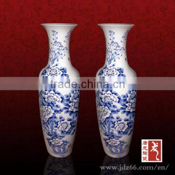 Art hand painted tall white porcelain vase with blue flowers