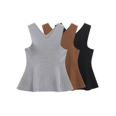 Nouveau style de printemps, corsage sans dos pour femmes d'Amérique et d'Europe, offrant un style sexy avec le dos découvert. Il s'agit d'un corsage sans dos avec une ouverture au dos, offrant un look sexy. Il est adapté aux femmes.