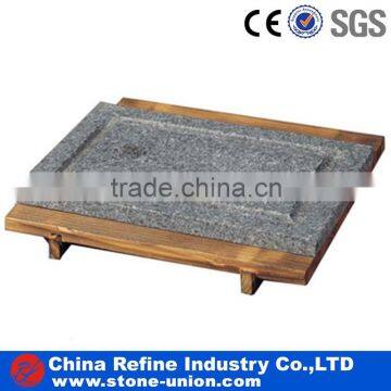 Stone plate with wooden base