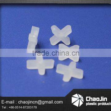 ground white cross spacer