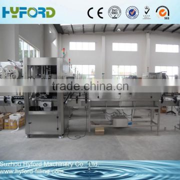 Automatic juice bottle shrink sleeve labeling machine