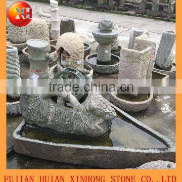 natural water fountain with child, garden stone fountain