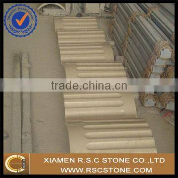 beige round marble column