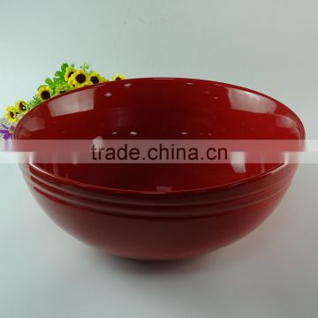 big red ceramic salad bowl