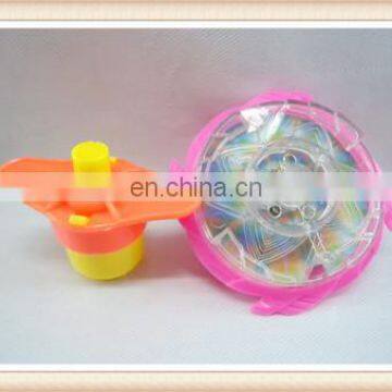 promotion toys plastic wind up light up spinning top