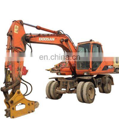 South Korea Low price Dosan digger wheeled DH140w wheel excavator cheap and excellent  in Shanghai