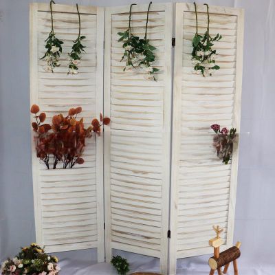 serves as a versatile and stylish room divider