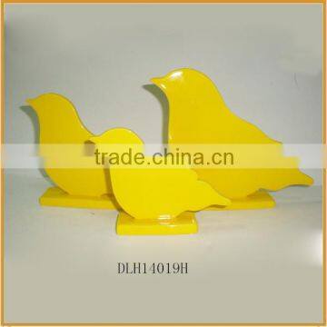 yellow color ceramic bird figurine