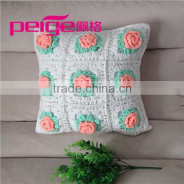 handmade white crochet cushion with flowers