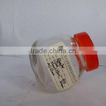 small mini glass candy bottle with plastic lid