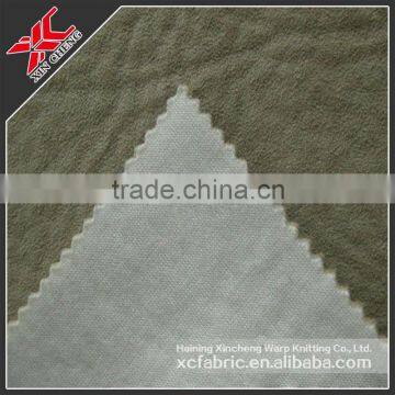 Solid polyester warp knitted suede bonded fabric for sofa