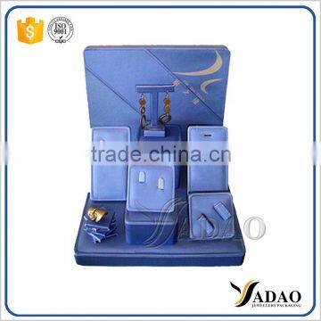 Alibaba hot selling blue pu leather cheap wooden jewelry display stand