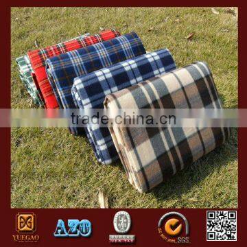 folded plaid waterproof picnic blanket