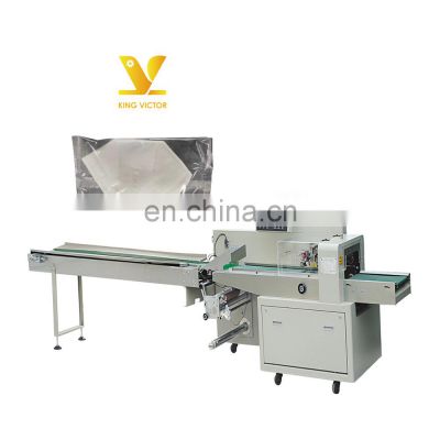 Automatic sealing and filling disposable KN95 medical mask horizontal flow pillow type packing machine