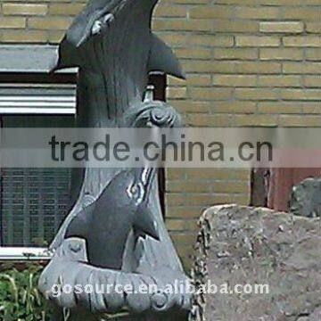 dolphin stone carving