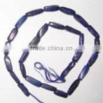 Lapis plain twisted gem beads.