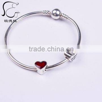 Promotional silver love charm bangle