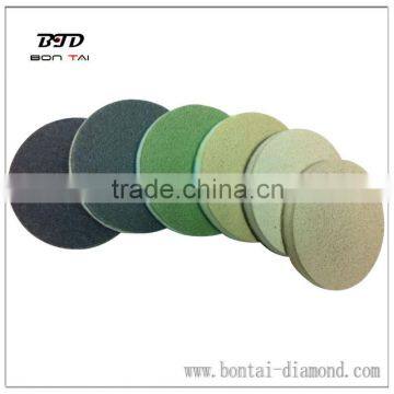 Polishing pads with diamond