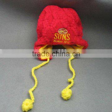 embroidered knitted beanie hat with pom pom