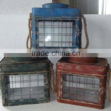 metal garden lantern with glass and rope handle