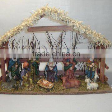 Cearmic nativity set with wooden house