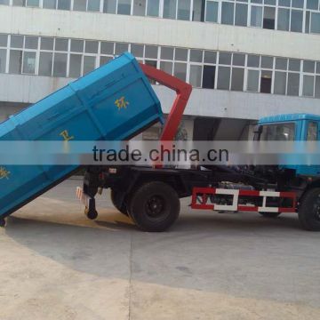 Hook lift garbage container truck