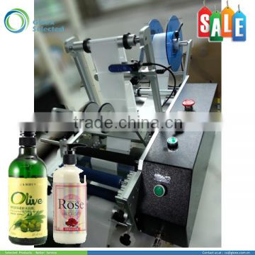 Semi automatic round bottle bopp labeling machine