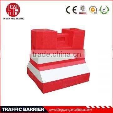 plastic jersey barriers on road