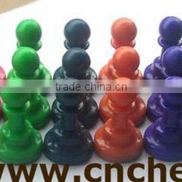 colored chess piece,checker piece,draughts piece