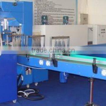 Automatic shrink wrapping packing machine