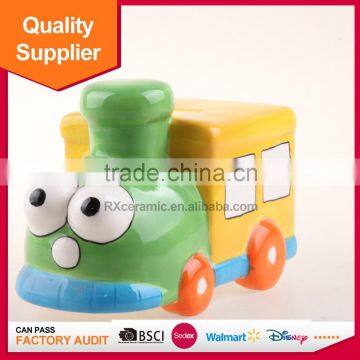 Hot selling train shape piggy bank ceramic coin bank with handle