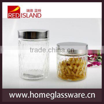 glass food and candy storage jar with carving pattern